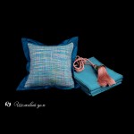 Бирюзовая шелковая фактурная наволочка на подушку с синим кантом